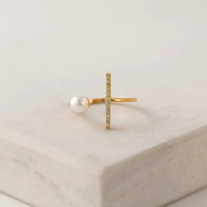 Lover's Tempo Neptune Pearl Gold Bar Ring featuring a smooth gold band with a lustrous pearl accent on the ring.