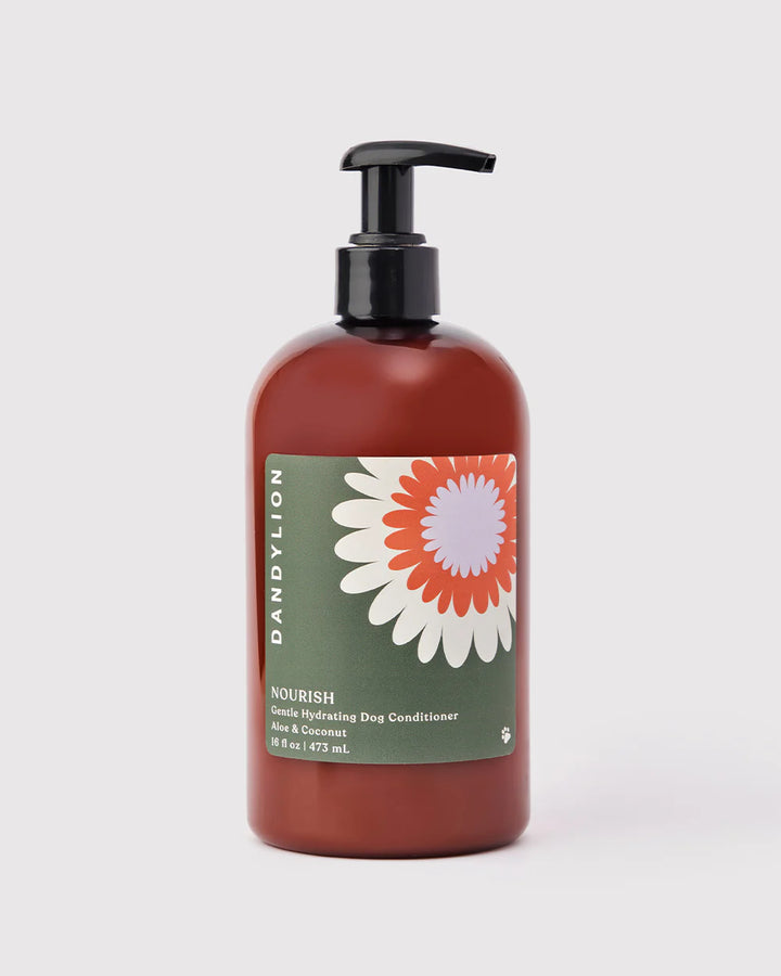 Dandylion Nourish gentle hydrating dog conditioner bottle with a pump dispenser, suitable for pets with sensitive skin.