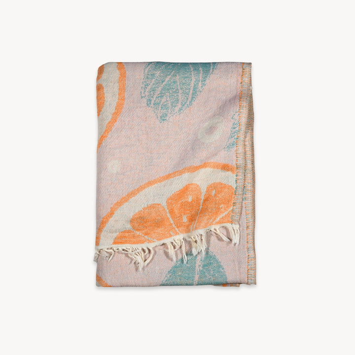 Orange Leaf Turkish Cotton Towel by Pokoloko, soft and plush, featuring vibrant orange leaf pattern, perfect for beach or bath use.