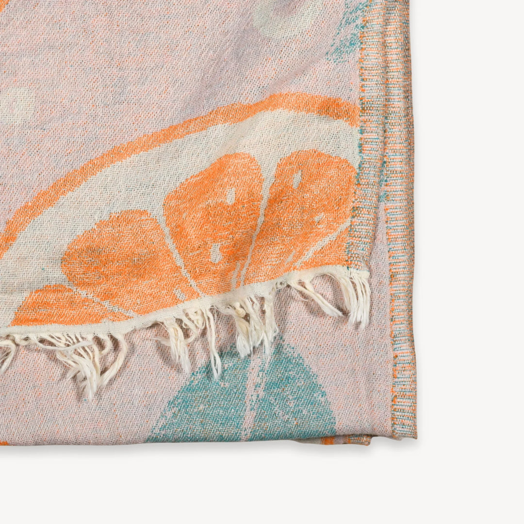 Orange Leaf Turkish Cotton Towel by Pokoloko, plush and lightweight fabric with orange leaf pattern, perfect for beach or bath use.