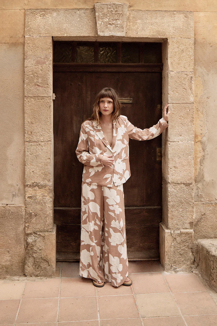 Molly Bracken Palm Bliss Palazzo Pant featuring flowy fabric, wide legs, and a tropical print for a relaxed, stylish look for summer and boho style.