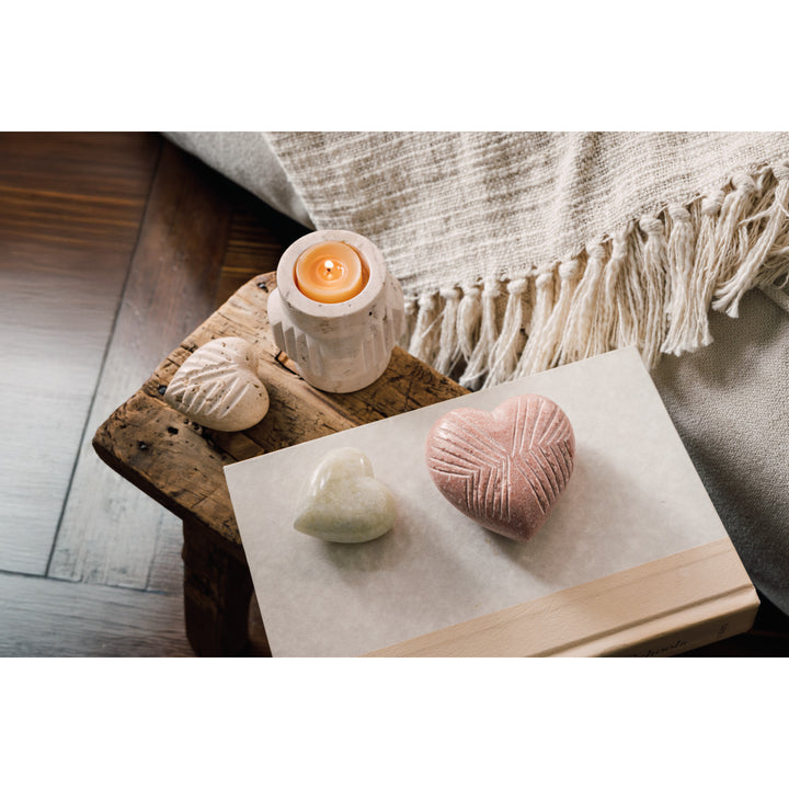 Danica marble heart decor piece featuring a textured carved  heart-shaped stone perfect for home decoration or display.