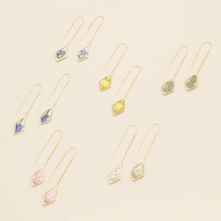 Scout pressed flower gold thread earring featuring delicate floral design and fine gold thread for a stylish accessory.