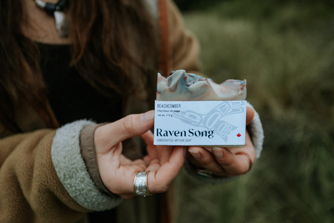 Hand soap by RavenSong Soap & Candle featuring citrus and peppercorn scent, with a natural artisanal design and textured label.