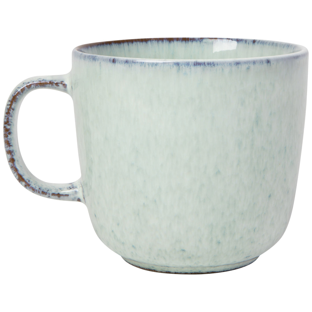 Danica Revive hand-etched stoneware collection featuring intricately designed ceramic dishes and bowls with botanical detailed patterns.