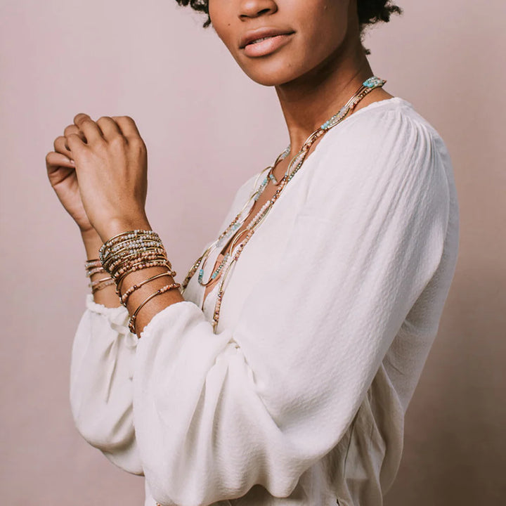 Scout Curated Wears wrap bracelet featuring layered leather and bead accents, stylish accessory for casual or boho outfits.