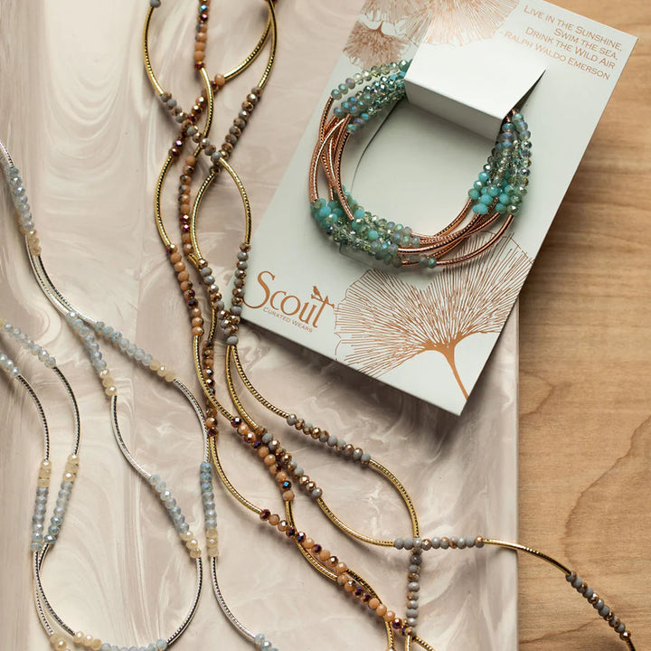Scout Curated Wears Neptune Rose Gold wrap bracelet featuring a stylish, adjustable design with intricate detailing.