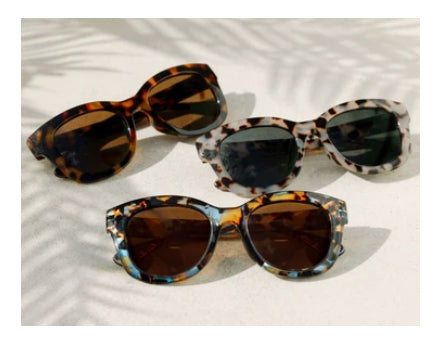 Peepers Center Stage polarized sunglasses with black frames and tinted lenses, showcasing a stylish and functional design.
