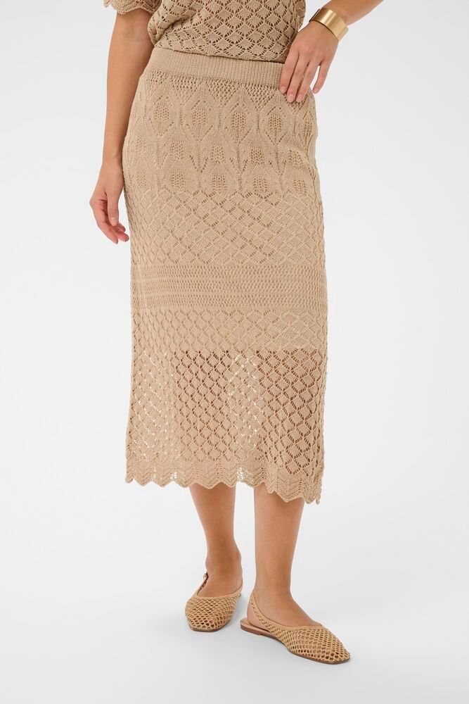 Cream Sevija Knit Midi Skirt showing a soft, beige knit fabric and a high-waisted, midi-length silhouette for summer style.