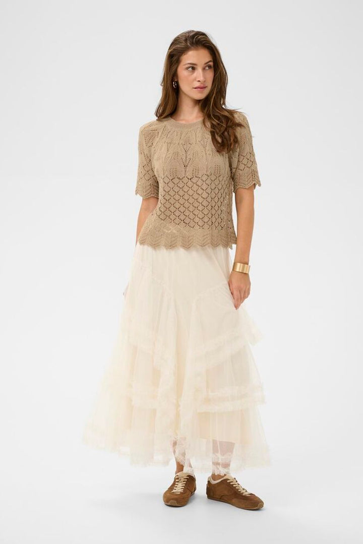 Cream Sevija knit short sleeve top, ribbed texture and classic crew neckline for summer vacation style.