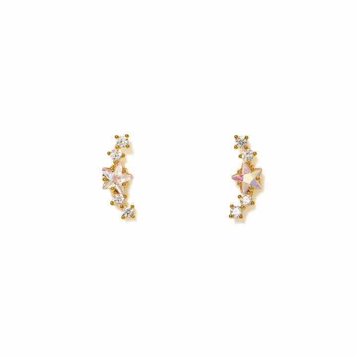Pair of gold and crystal earrings on a white background