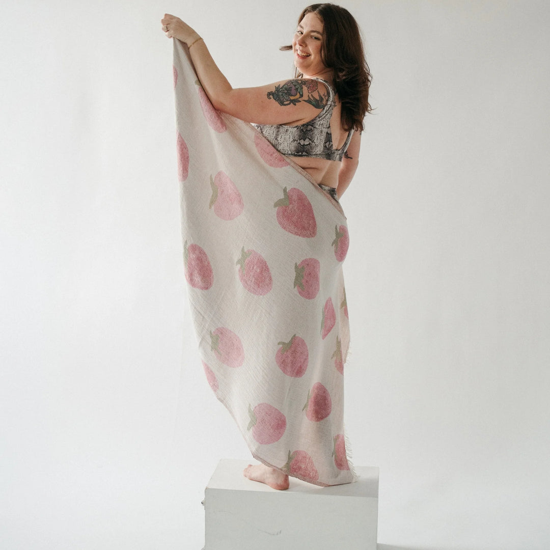 Pokoloko strawberry shortcake Turkish cotton towel with vibrant red and pink strawberry pattern and soft, absorbent fabric.