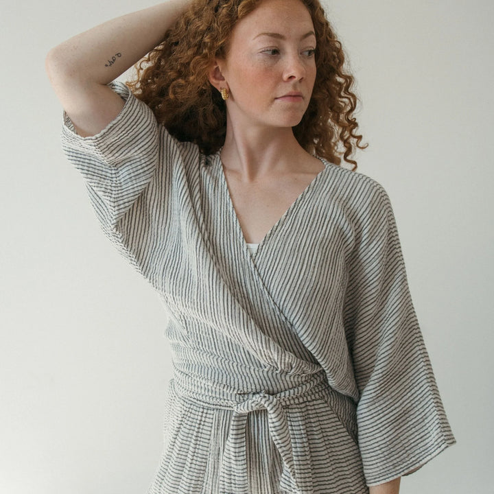 Pokoloko striped crinkle cotton balloon sleeve top with a relaxed fit and soft vertical stripe pattern.