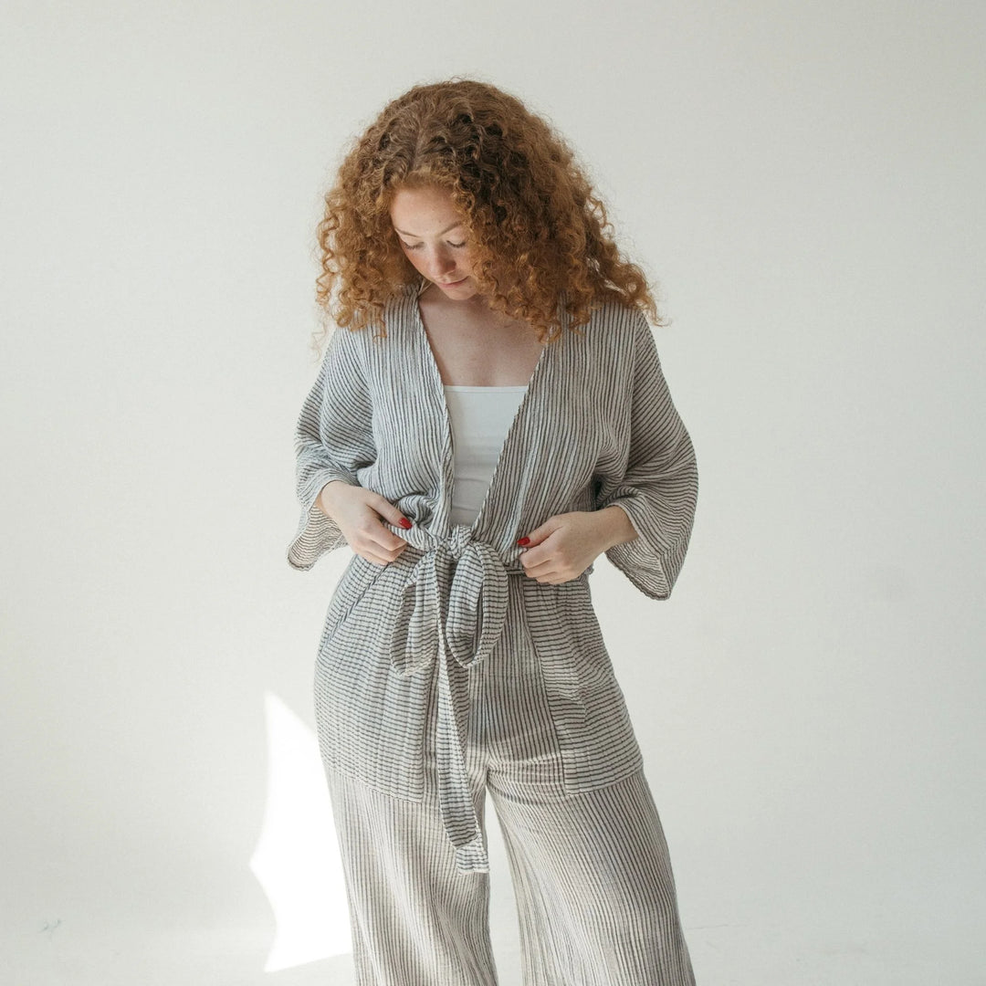 Pokoloko striped crinkle cotton balloon sleeve top featuring a relaxed fit and soft  vertical stripes.