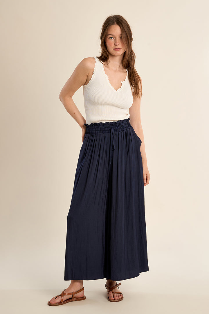Navy palazzo pant from Molly Bracken with a flowing, wide-leg design and smooth fabric for a stylish, comfortable look for  day or night..