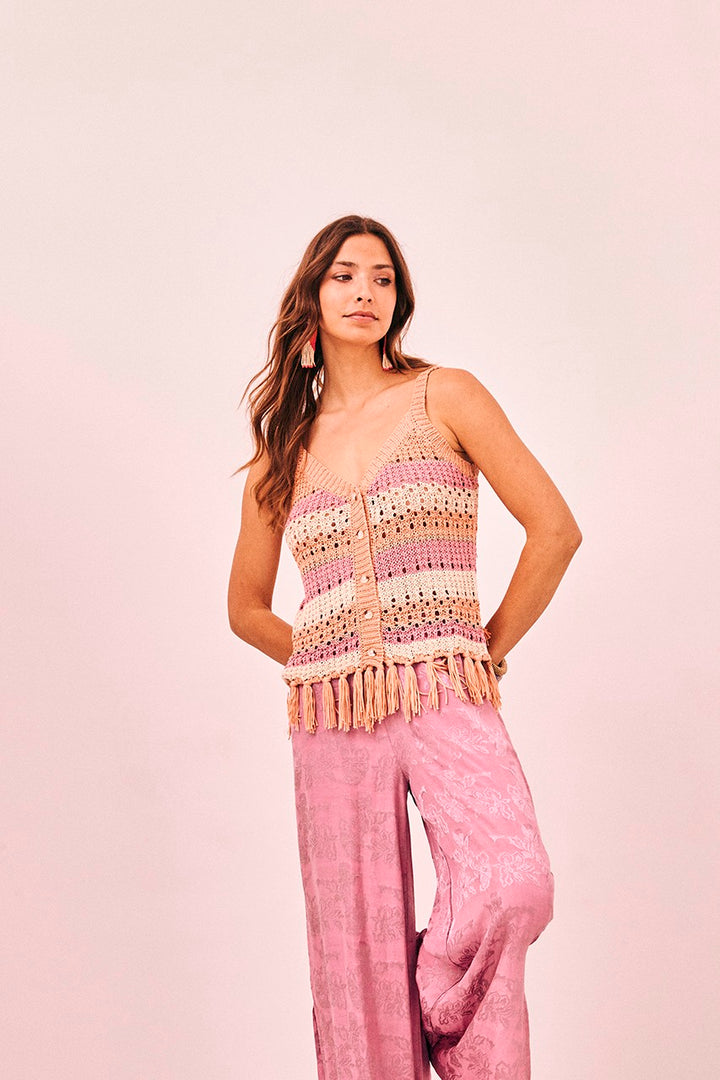 Women’s bohemian style knit tank top with peach, pink and cream stripes and button front with tassel details 