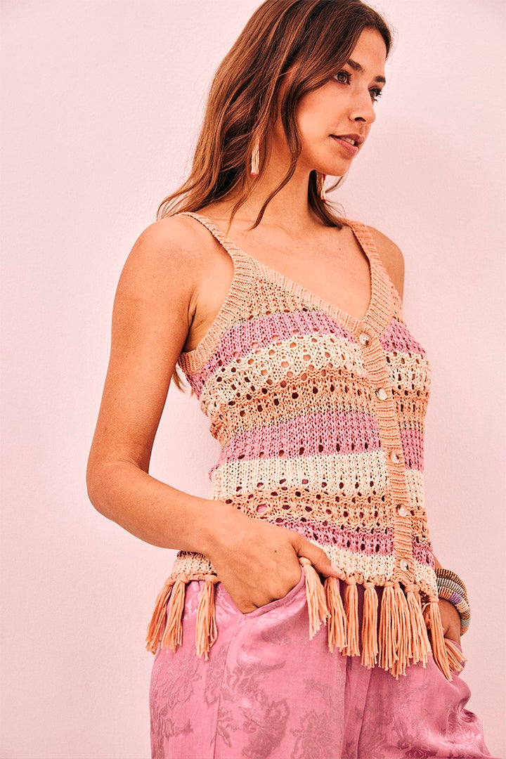 Women’s bohemian style knit tank top with peach, pink and cream stripes and button front with tassel details 