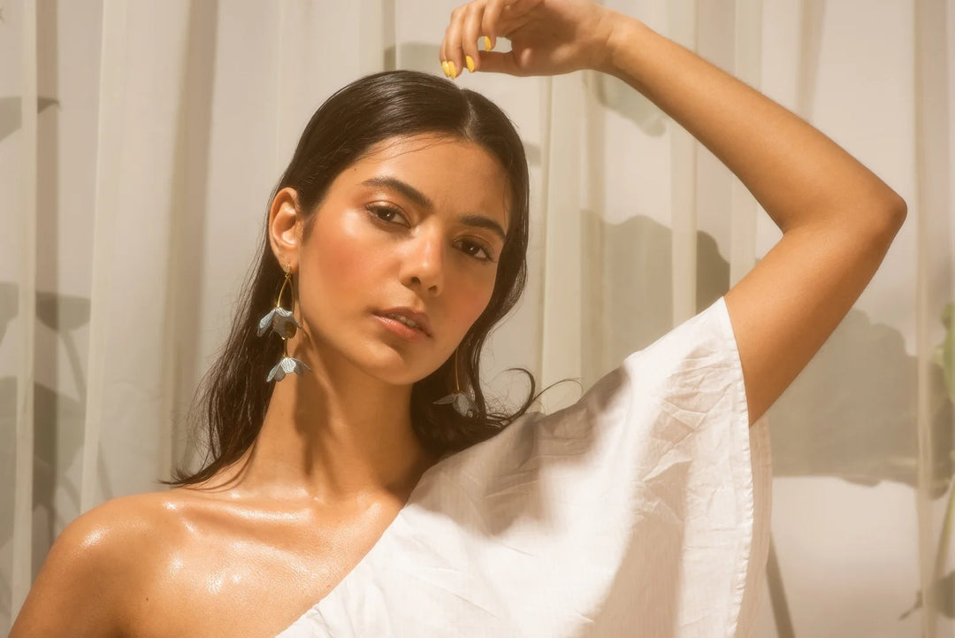 Tahitian Gardenia Flower Earring by Ilk Jewelry featuring a delicate floral design in vintage lace with intricate detailing.
