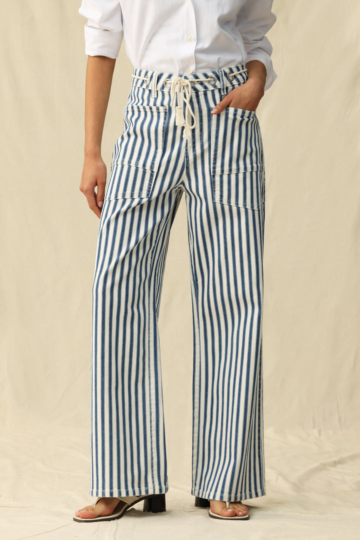 Model wearing Tamsin Rail Stripe Wide Leg Jeans by Bayeas, showcasing the stylish blue and white stripe pattern and relaxed fit.