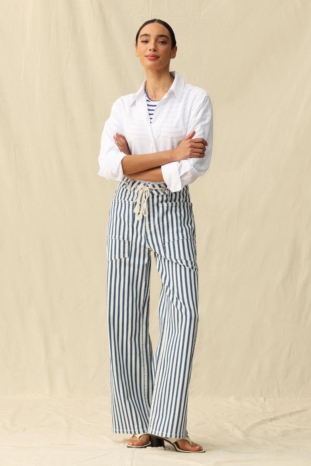 Woman wearing Bayeas Tamsin Rail Stripe Wide Leg Jeans, showcasing relaxed fit and stylish striped design against a neutral background.