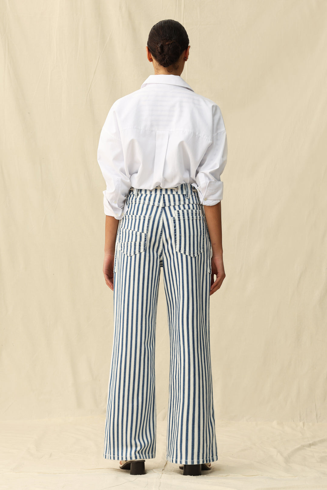 Bayeas Tamsin Rail Stripe Wide Leg Jeans worn by a person, featuring a stylish rail stripe pattern and relaxed fit against a neutral background.