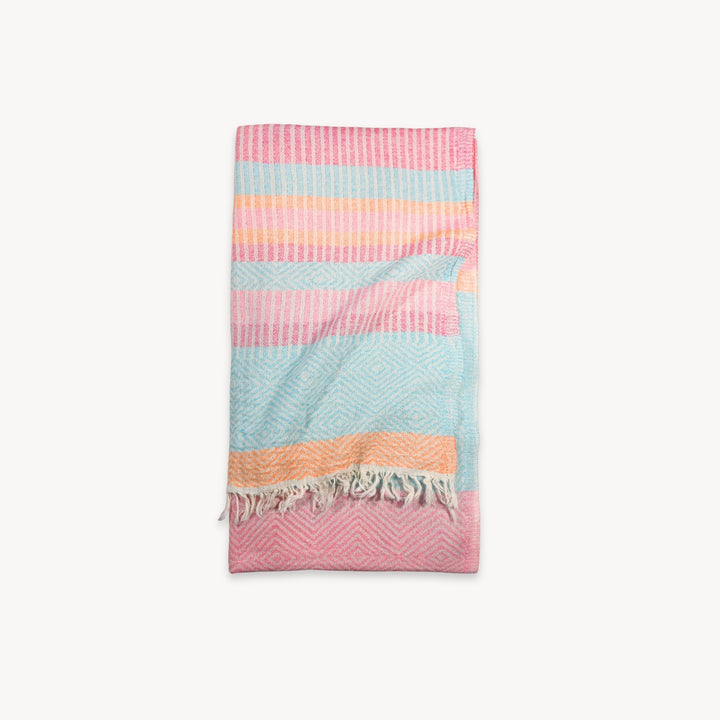 Pokoloko Teaberry Stripe Turkish Cotton Towel with vibrant red and white stripes, soft and absorbent for beach or bath use.
