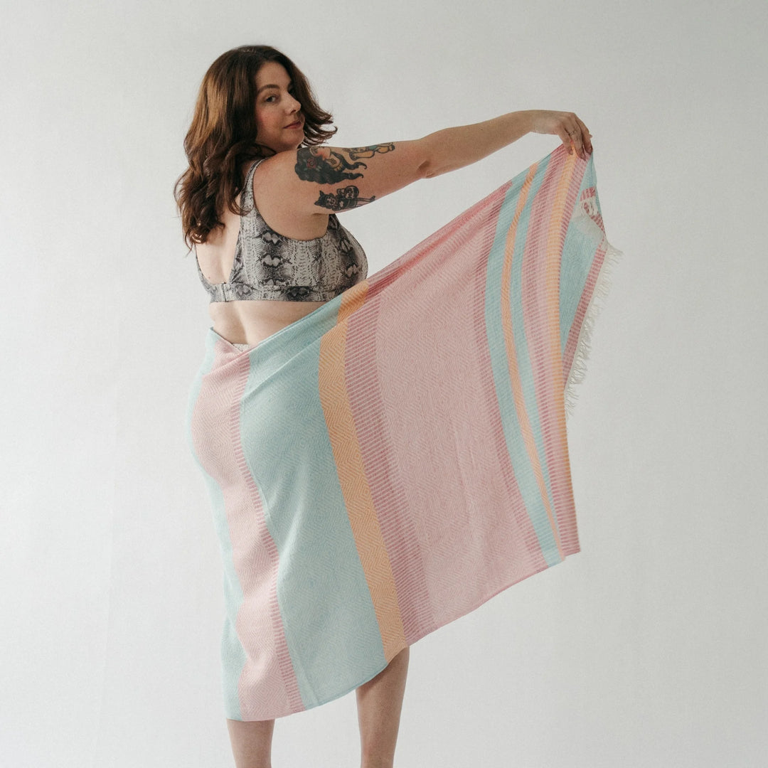 Turkish cotton towel with Teaberry Stripe pattern from Pokoloko, featuring soft, absorbent fabric and vibrant stripe design.