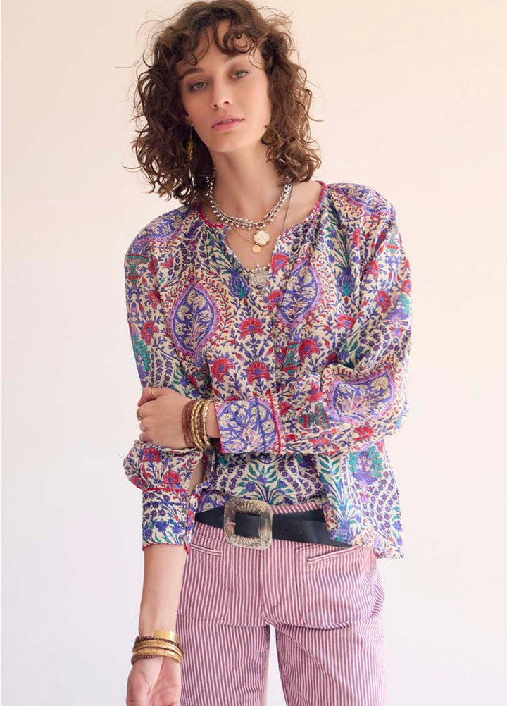 Pink Portofino striped Diana bootcut jean pant by MKT Studio with a classic fit and vibrant stripe pattern for retro boho look.