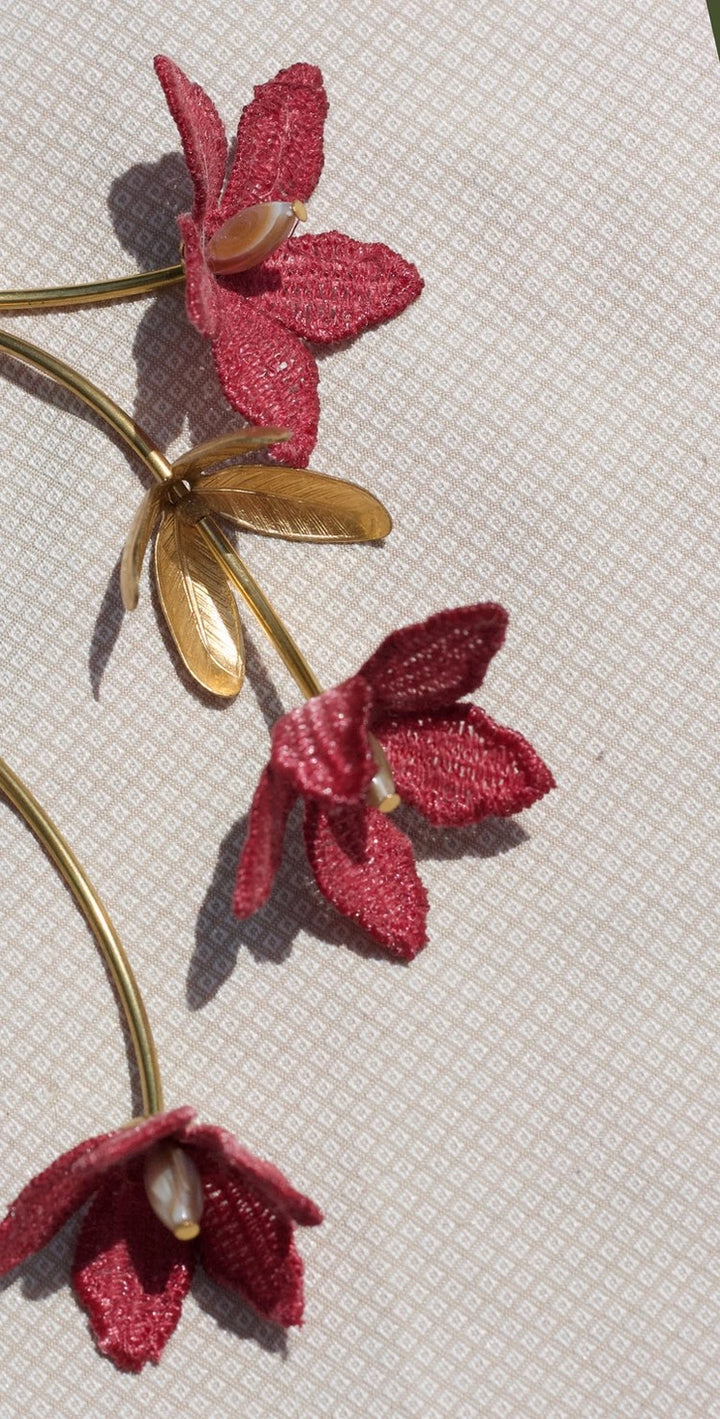 Tahitian Gardenia Flower necklace by Ilk Jewelry featuring a delicate floral pendant on a silver chain.