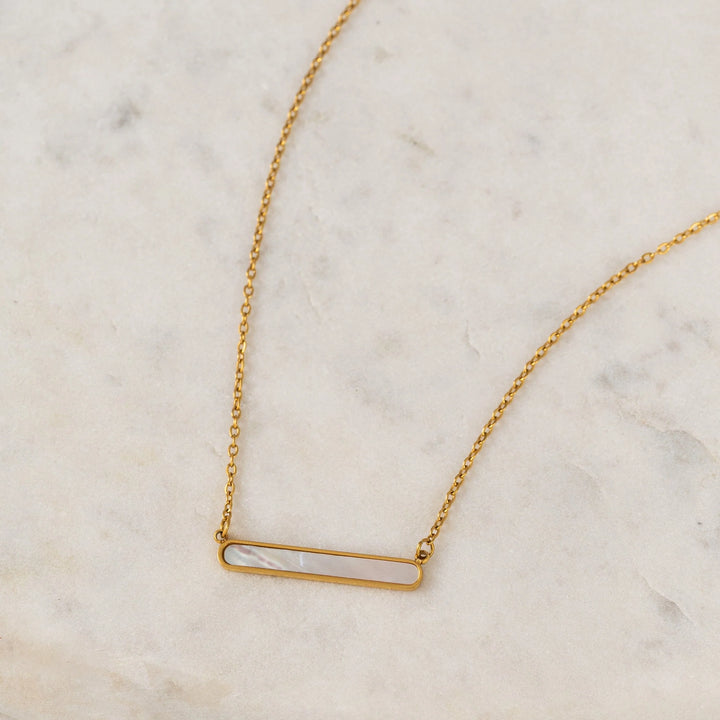 Lover's Tempo Tolfino Mother of Pearl Necklace with elegant, iridescent shell pendant on a delicate gold chain.
