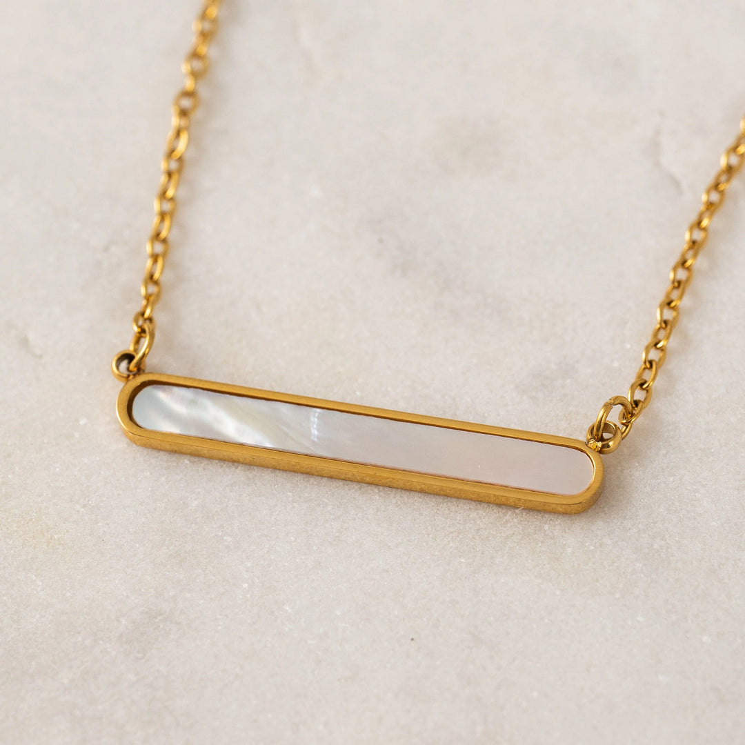 Lover's Tempo Tolfino Mother of Pearl Necklace featuring a delicate gold chain and lustrous pearl pendant for elegant wear.
