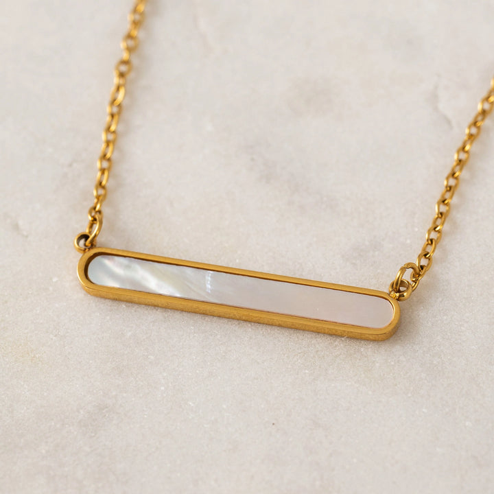 Lover's Tempo Tolfino Mother of Pearl Necklace featuring a delicate gold chain and lustrous pearl pendant for elegant wear.