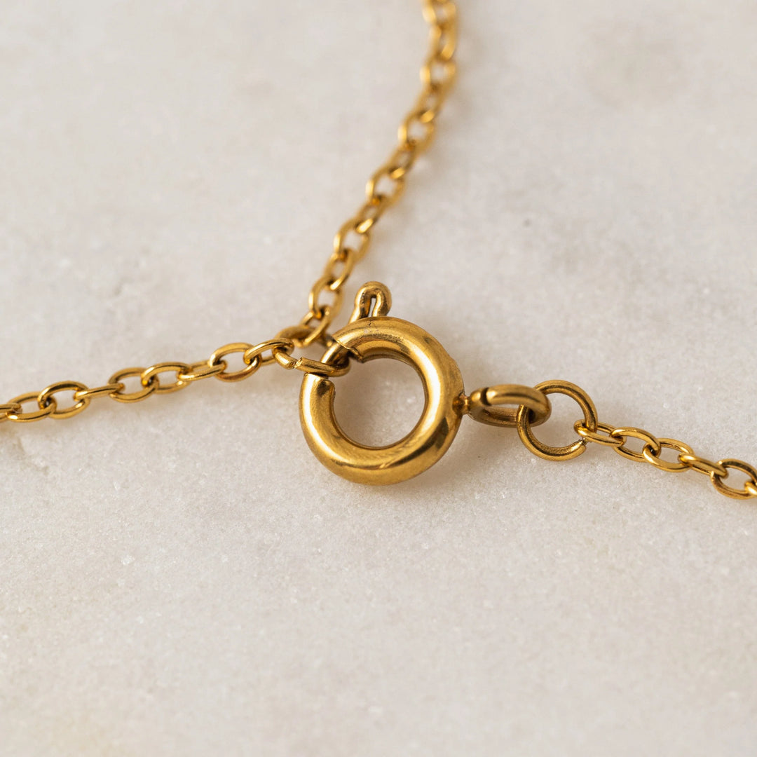 Lover's Tempo Tolfino Mother of Pearl Necklace showcasing a delicate pendant with iridescent mother of pearl on a fine gold chain
