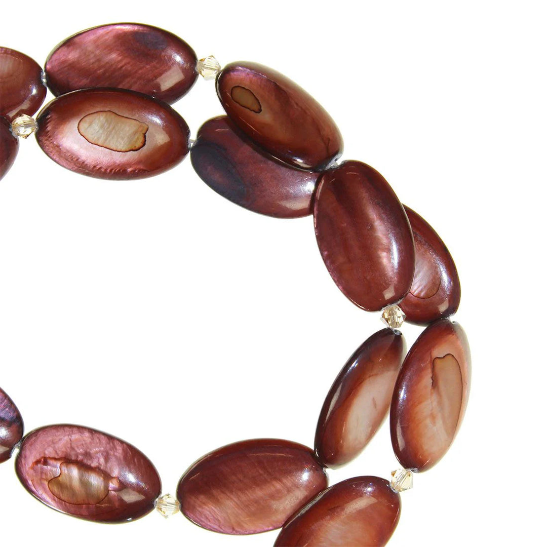 Red oyster shell necklace by Lofttan featuring natural oyster shell beads on a delicate chain.
