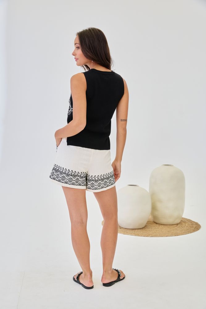 NKN by Nekane Ulis abstract yarn knit tank top featuring a  textured yarn design and sleeveless style.