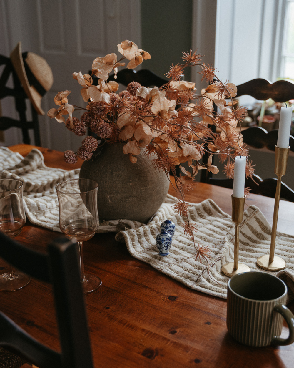 Indaba Serres Earthy Textured Terracotta Vase showcasing a rustic, handcrafted ceramic design with a warm, natural finish.