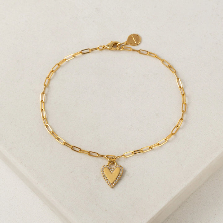Women’s gold plated paper clip chain bracelet with cubic zirconia stones on heart charm