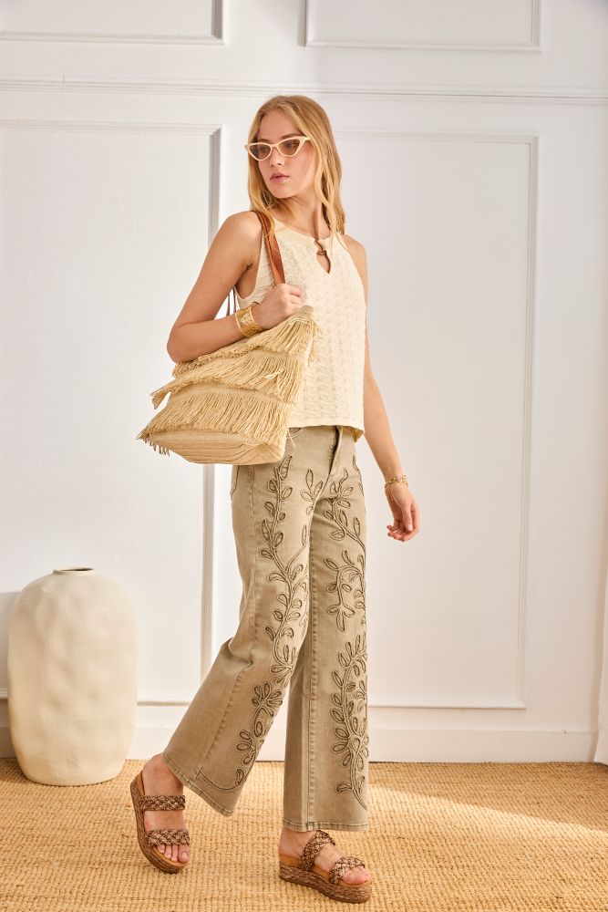 Virginia floral embroidered khaki jeans by NKN by Nekane, featuring detailed floral embroidery and classic pant style.