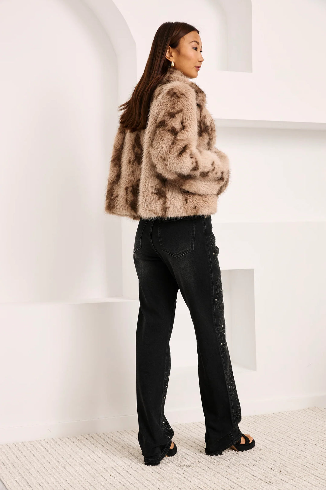NKN Nekane Talia faux fur jacket featuring plush cream-colored fur with a stylish collar and cozy fit.