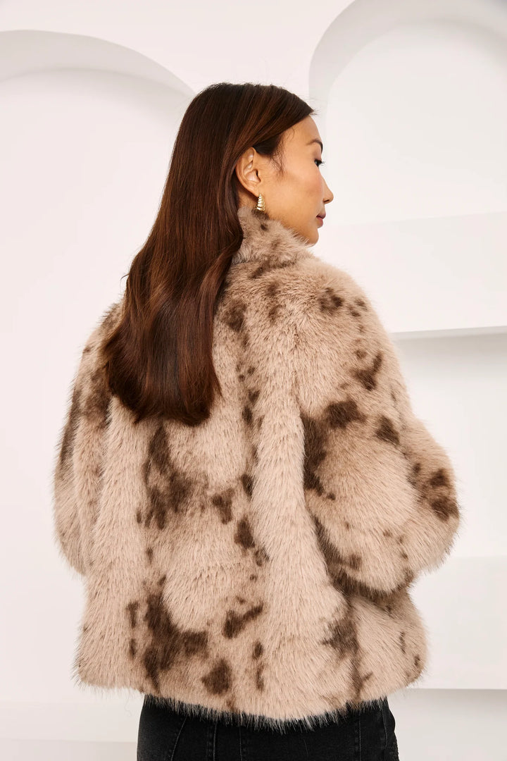 NKN Nekane Talia Faux Fur Jacket in plush, soft fur with a stylish collar, shown on a model against a neutral background.