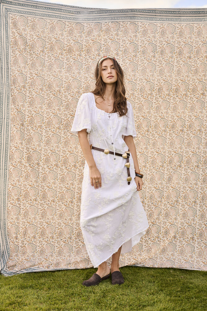Cream Zammi Maxi Dress featuring flowing fabric, cap sleeve design,  textured floral embroidery, and a stylish round neckline, perfect for casual or formal occasions.