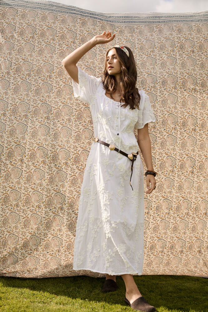 Cream Zammi Maxi Dress featuring a flowing silhouette, soft fabric,  textured floral embroidery, and elegant design ideal for casual or formal occasions.