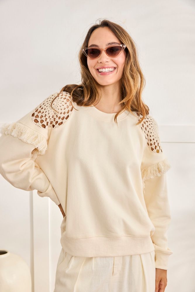 NKN by Nekane Zuno Fringe Sweatshirt, cozy sweater with fringe details, soft cotton fabric, and relaxed fit for casual boho wear.