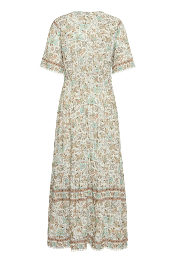 light green, beige and cream boho floral  maxi dress with tassel tie at waist and embroidered trim at v neckline. 