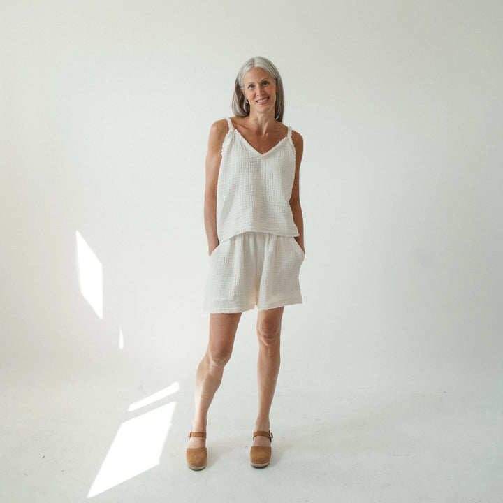 Crinkle cotton strappy tank top by Pokoloko featuring lightweight fabric and frayed straps for a casual, breezy style.