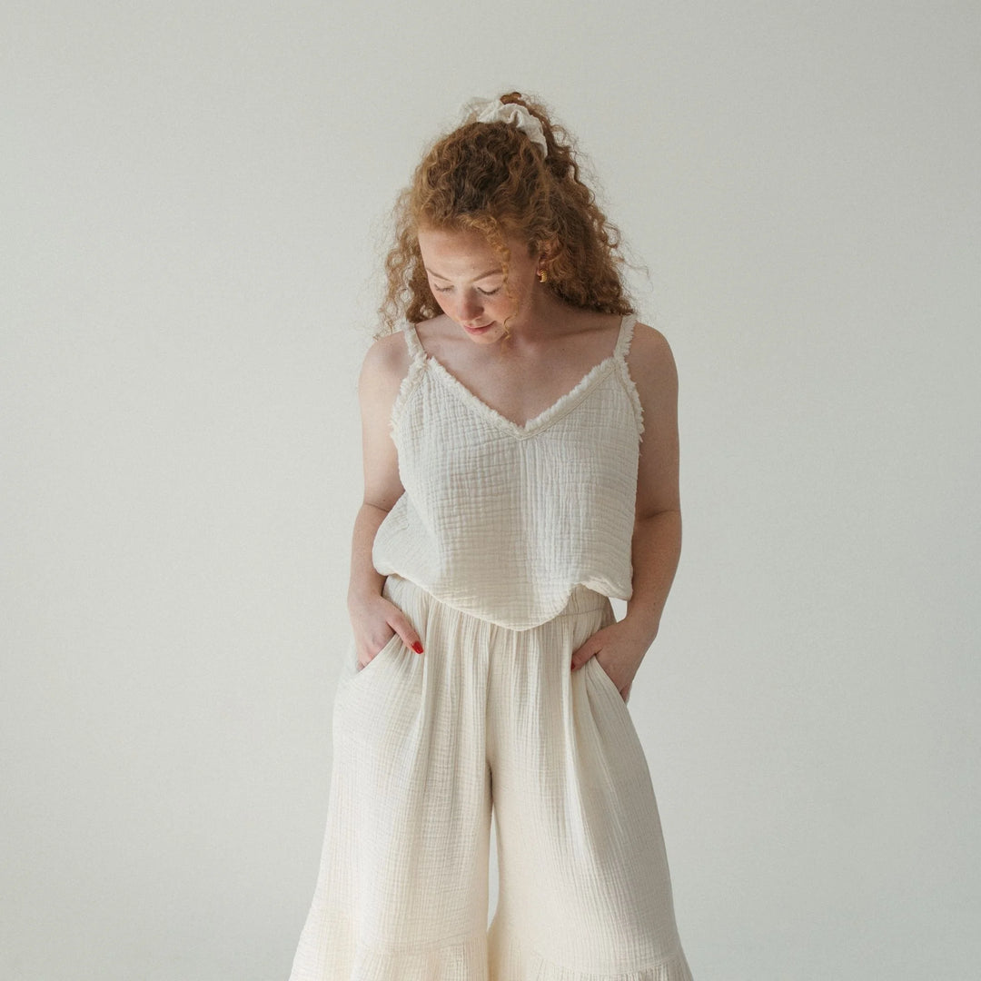 Pokoloko crinkle cotton strappy tank top featuring thin straps and lightweight, textured fabric for casual summer wear.