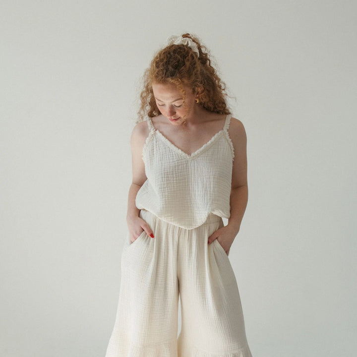 Pokoloko crinkle cotton strappy tank top featuring thin straps and lightweight, textured fabric for casual summer wear.