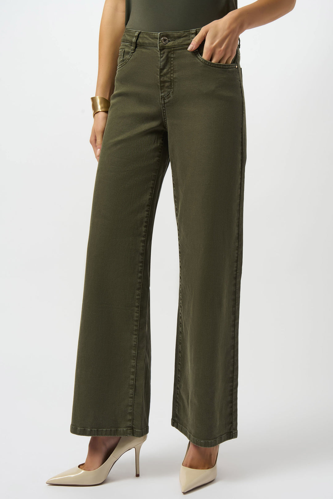 woman wearing dark green denim jeans with flare style