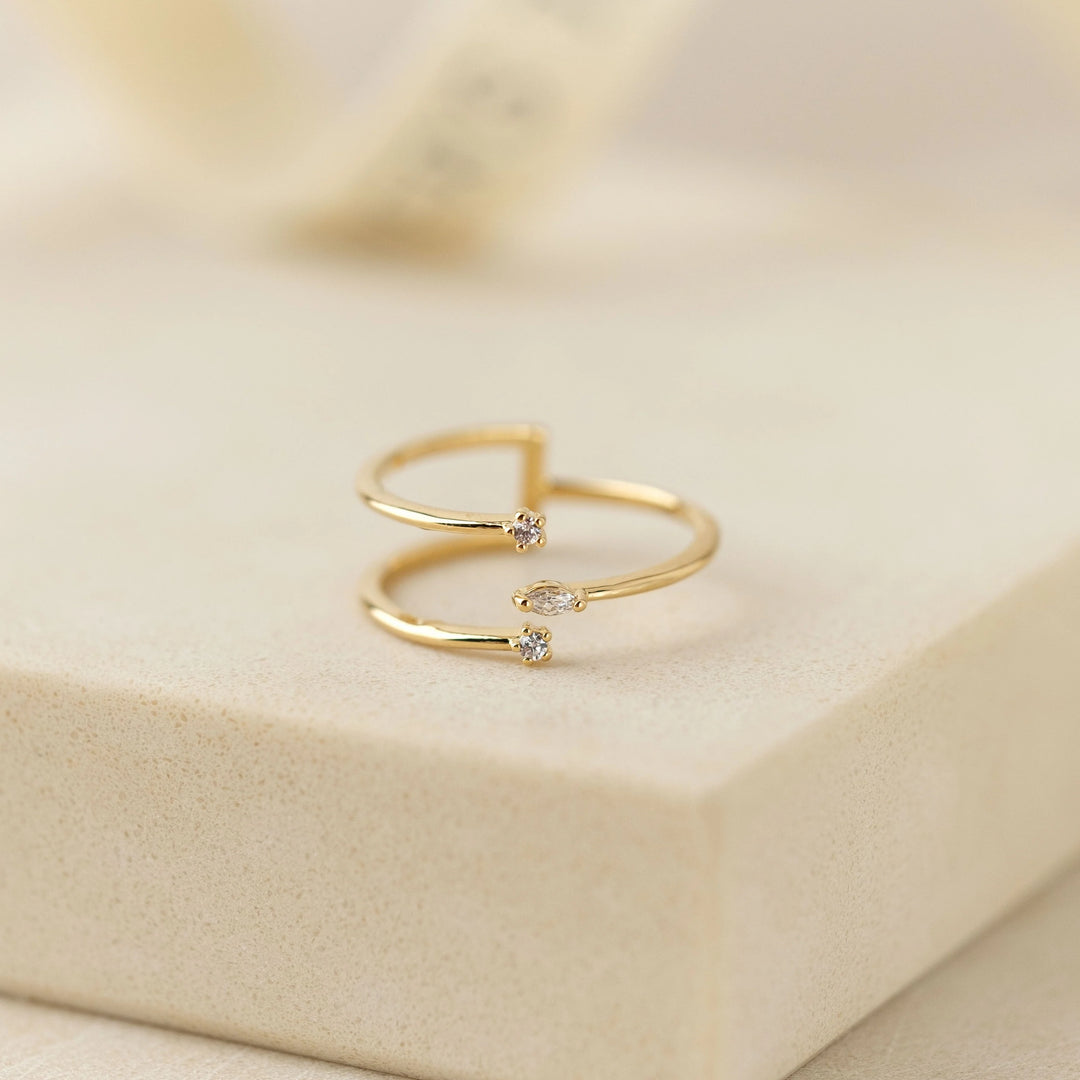 gold plated open size triple band ring with cubic zirconia stones