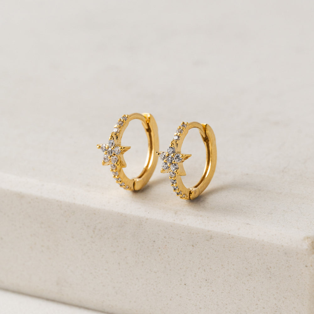 gold  star huggie hoop earrings